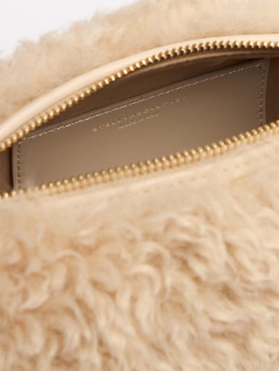 Stella McCartney: Cylindrical shearling-effect shoulder bag