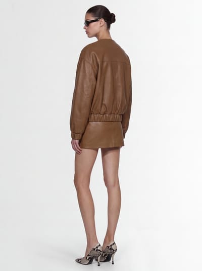 Khaite: A-line lambskin mini skirt