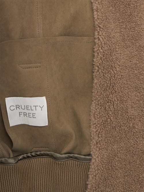 Stella McCartney: chaqueta de ante alter con ribete de felpa