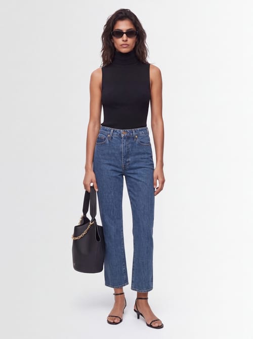 Khaite: Jeans Abigail a zampa in cotone
