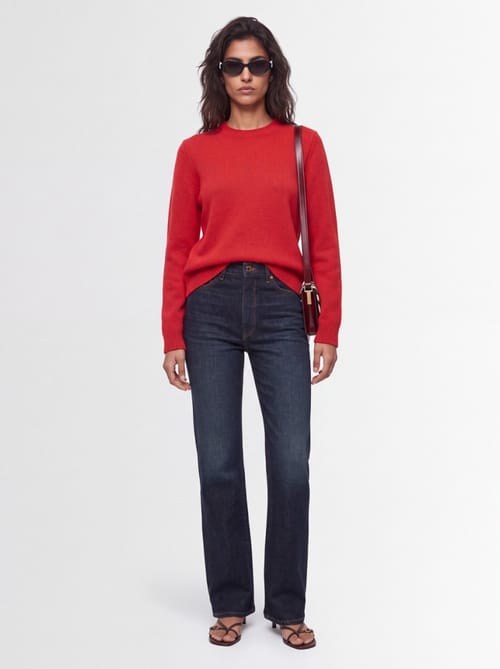 Khaite: Cotton denim flare jeans