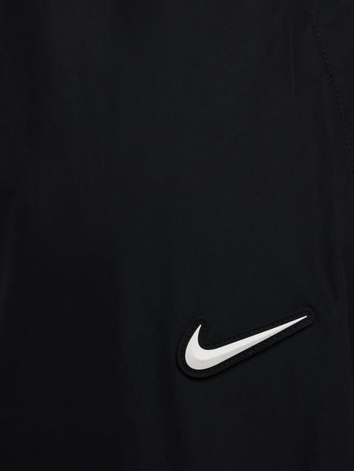 Nike: Nylon track pants with logo