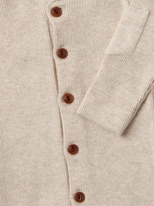 1 + IN THE FAMILY: Buttoned romper