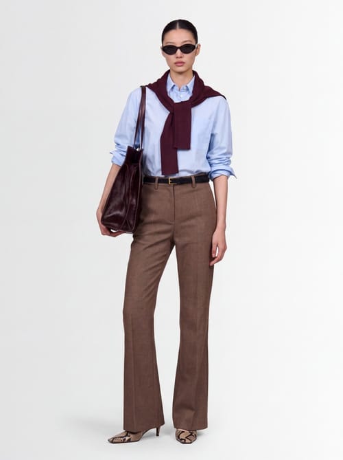 CRUNA: Flared pants with pressed creases