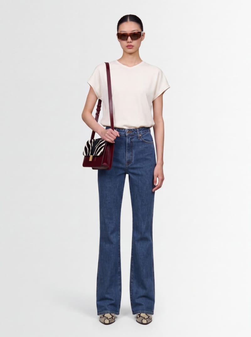 Khaite - Flared cotton denim jeans