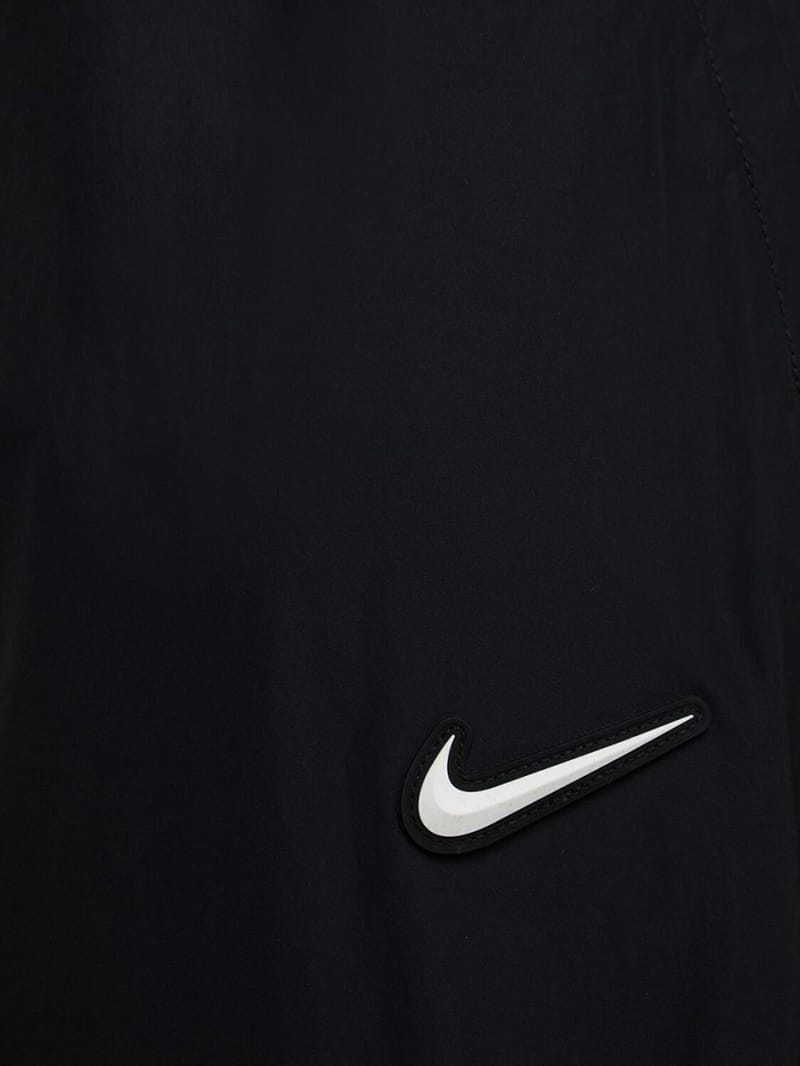 Nike: Nylon track pants with logo