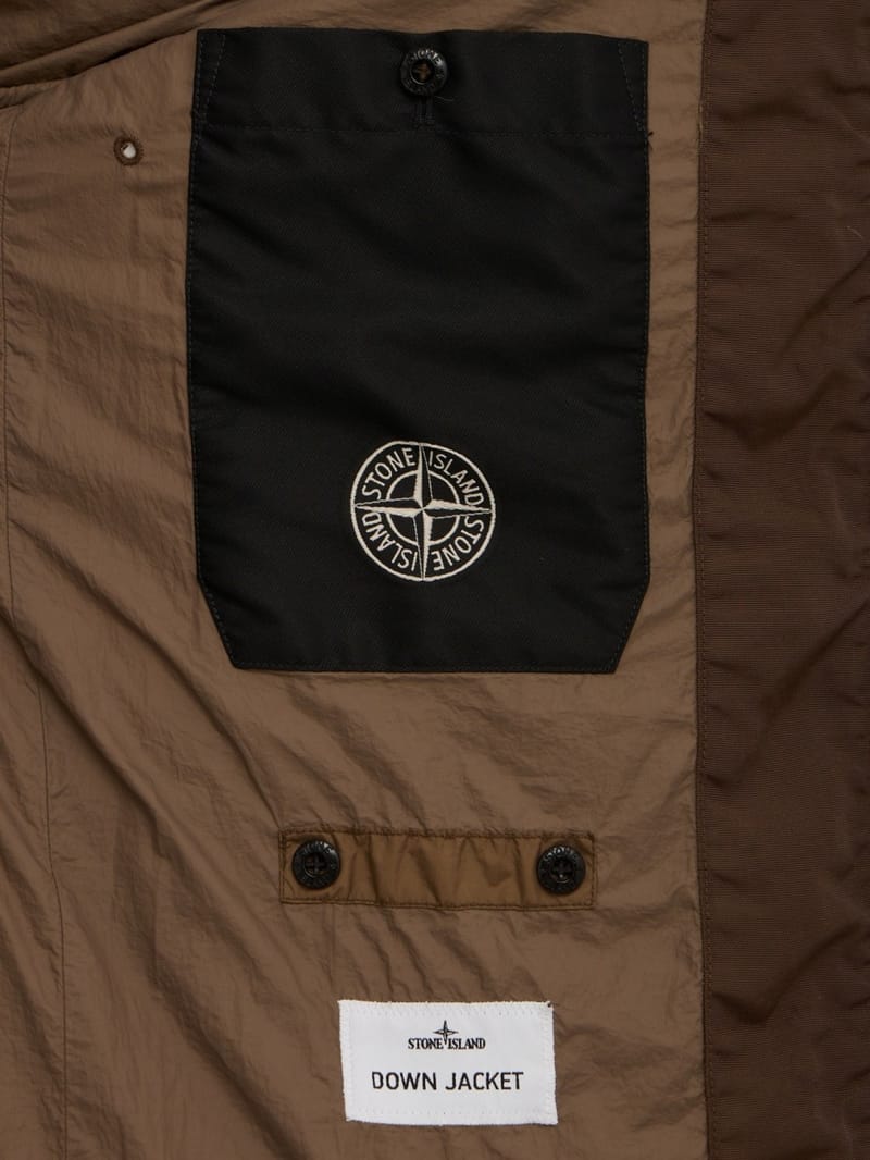 Stone Island: Nylon hooded down jacket