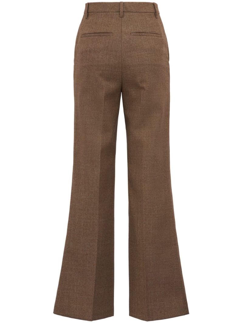 CRUNA: Flared pants with pressed creases